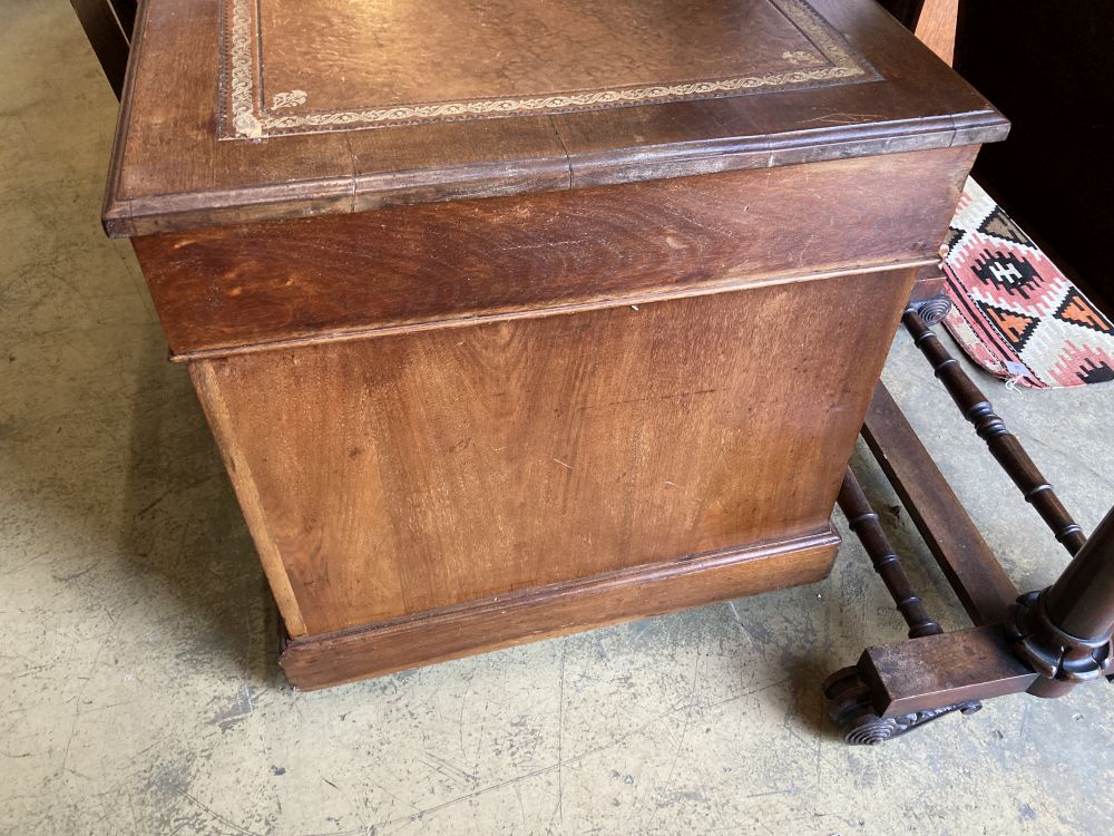 A late Victorian mahogany pedestal desk, width 138cm, depth 71cm, height 74cm together with an Art Nouveau inlaid chair